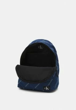 Calvin Klein Jeans LOGO BACKPACK UNISEX - Sac à Dos - Denim -Calvin Klein Elegant Magasin 46ae055b6e4c4db6aa0f63882da3d615
