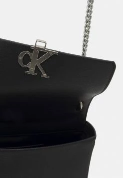 Calvin Klein Jeans MINIMAL MONOGRAM FLAP - Sac Bandoulière - Black -Calvin Klein Elegant Magasin 4c547395641342b6bf1f4bcfeb0527ac