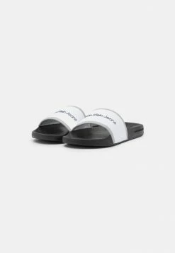 Calvin Klein Jeans INSTITUTIONAL SLIDE - Mules - Bright White 8 Calvin Klein Jeans INSTITUTIONAL SLIDE - Mules - Bright White -Calvin Klein Elegant Magasin 4c8aa9450493410ea3b19c4d90725f7e