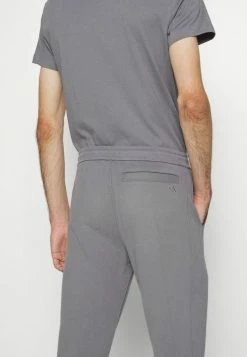 Calvin Klein Jeans MICRO BRANDING PANT - Pantalon De Survêtement - Fossil Grey -Calvin Klein Elegant Magasin 4d86646e0510497d947206918659982b