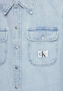 Calvin Klein Jeans SHIRT JACKET - Chemisier - Denim Light -Calvin Klein Elegant Magasin 504fed4a50f24bdaa6a491e8d28ed398