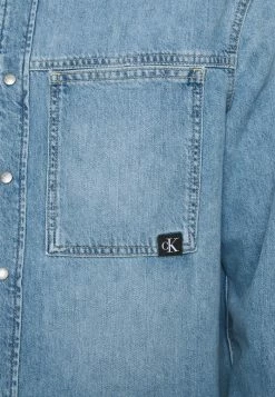 Calvin Klein Jeans LINEAR SHIRT - Chemise - Denim Medium 9 Calvin Klein Jeans LINEAR SHIRT - Chemise - Denim Medium -Calvin Klein Elegant Magasin 50ab853e736a4ab1a8a4a165c2a9f79a