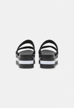 Calvin Klein Jeans FLATFORM TWOSTRAPS - Mules à Talons - Black -Calvin Klein Elegant Magasin 522dc0c983c34a789ee8145f9524bfba
