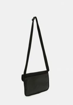 Calvin Klein Jeans UTILITY GRID XBODY UNISEX - Sac Bandoulière - Black -Calvin Klein Elegant Magasin 527a288d4ea54161aa698b0ff372714d