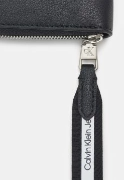 Calvin Klein Jeans ULTRALIGHT ZIP AROUND - Portefeuille - Black -Calvin Klein Elegant Magasin 5343319d66f44007a66c1391705b023f