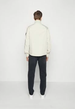 Calvin Klein Jeans HARRINGTON - Veste Mi-saison - Eggshell 12 Calvin Klein Jeans HARRINGTON - Veste Mi-saison - Eggshell -Calvin Klein Elegant Magasin 5838b0241350482695f34a6a23a71cf5