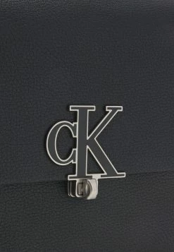 Calvin Klein Jeans MINIMAL MONOGRAM MINI TOP HANDLE - Sac à Main - Black -Calvin Klein Elegant Magasin 584485db8ff5415c8faca9018f7797e8
