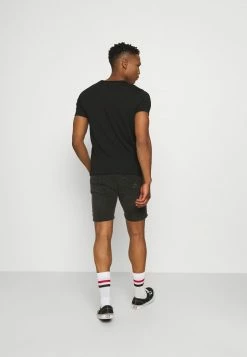 Calvin Klein Jeans MICRO BRANDING ESSENTIAL TEE - T-shirt Basique - Black -Calvin Klein Elegant Magasin 58dfa356027345758d13c15282b40f47