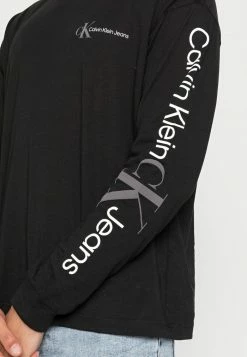 Calvin Klein Jeans URBAN GRAPHIC TEE - T-shirt à Manches Longues - Black -Calvin Klein Elegant Magasin 59f3da18ea8a49b2abd05266a74e5f2d