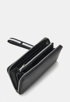 Calvin Klein Jeans ULTRALIGHT ZIP AROUND - Portefeuille - Black -Calvin Klein Elegant Magasin 5ad87c7d4d8448f0a076fd4404ea6432