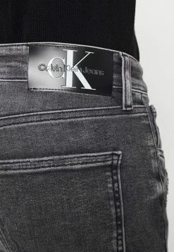 Calvin Klein Jeans SKINNY - Jeans Skinny - Denim Black -Calvin Klein Elegant Magasin 5e007f74fc7f43278f770cee8f5251ab
