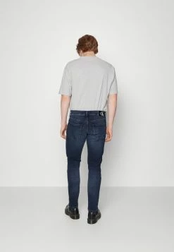 Calvin Klein Jeans SLIM - Jean Slim - Denim Dark -Calvin Klein Elegant Magasin 60ee7325febb4a8a90f8c299a831b585