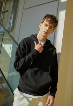 Calvin Klein Jeans REPEAT LOGO HOODIE UNISEX - Sweatshirt - Black -Calvin Klein Elegant Magasin 645281a871e64c4f9efbadcc964fd040