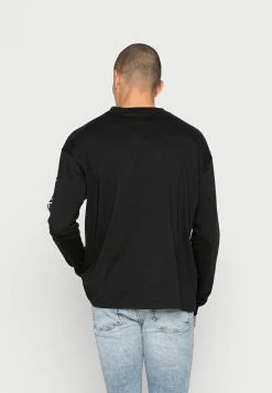 Calvin Klein Jeans URBAN GRAPHIC TEE - T-shirt à Manches Longues - Black -Calvin Klein Elegant Magasin 66daa7e466494322a942be09f7f8d554