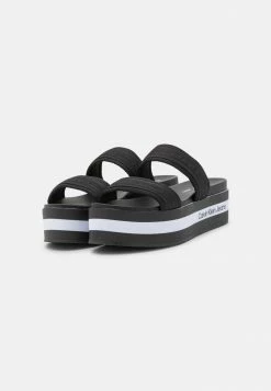 Calvin Klein Jeans FLATFORM TWOSTRAPS - Mules à Talons - Black -Calvin Klein Elegant Magasin 685c1430ef3a4fb383b7224dca849555