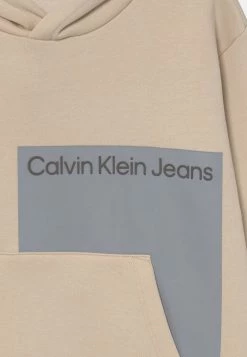 Calvin Klein Jeans PLACED BLOCK RELAXED HOODIE UNISEX - Sweatshirt - Muslin -Calvin Klein Elegant Magasin 6871c356918c4e518d781dad56f46fd3