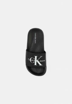 Calvin Klein Jeans Sandales De Bain - Black -Calvin Klein Elegant Magasin 68d38cbf786e4be497b928a1798ec4f2
