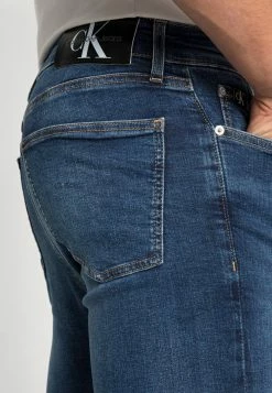 Calvin Klein Jeans SUPER SKINNY - Jeans Skinny - Denim Dark -Calvin Klein Elegant Magasin 6c861825943647afbc550e1e79a885e8