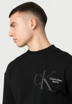 Calvin Klein Jeans DYNAMIC CREW NECK UNISEX - Sweatshirt - Black -Calvin Klein Elegant Magasin 6d47e3eca6114a098792421401b1aef8