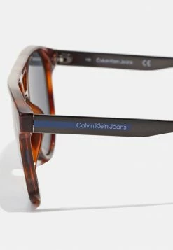 Calvin Klein Jeans Lunettes De Soleil - Brown -Calvin Klein Elegant Magasin 6faa2e0ba56d4b30a61da377a8bf474e