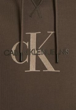 Calvin Klein Jeans ARCHIVAL MONOGRAM HOODIE UNISEX - Sweatshirt - Black Olive/crockery -Calvin Klein Elegant Magasin 705fd1f678ed42ddbe7c068fbaa3c2b4