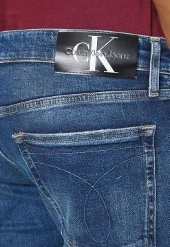 Calvin Klein Jeans SLIM - Jean Slim - Denim Dark -Calvin Klein Elegant Magasin 749d7b79381242ae99755524029e110c