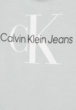 Calvin Klein Jeans MONOGRAM TEE BABY UNISEX - T-shirt Imprimé - Muted Aqua -Calvin Klein Elegant Magasin 75cb547c09fe4b0bbe72f87899d20f05