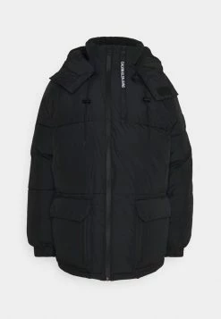 Calvin Klein Jeans BLOCKING HOODED PUFFER - Veste D'hiver - Black -Calvin Klein Elegant Magasin 76a2f2ebc8ea4ed2a5f3b3fac60e6bd9