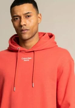Calvin Klein Jeans STACKED LOGO - Sweat à Capuche - Rot -Calvin Klein Elegant Magasin 77d2011375a34f38ba95fb65eef584ae