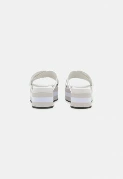 Calvin Klein Jeans FLATFORM CRISSCROSS - Mules à Talons - Bright White 9 Calvin Klein Jeans FLATFORM CRISSCROSS - Mules à Talons - Bright White -Calvin Klein Elegant Magasin 79aaaa0cdac749e7a56aeeac8fad51e7