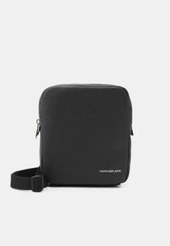 Calvin Klein Jeans MICRO PEBBLE REPORTER S - Sac Bandoulière - Black