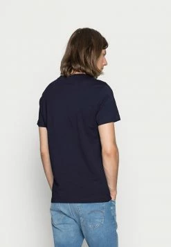 Calvin Klein Jeans ICONIC MONOGRAM SLIM TEE - T-shirt Imprimé - Night Sky -Calvin Klein Elegant Magasin 7c47655d976543598912a22b22624a68