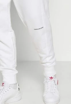 Calvin Klein Jeans MICRO BRANDING PANT - Pantalon De Survêtement - White -Calvin Klein Elegant Magasin 8162d65f802d42109f48cd828d1317bf
