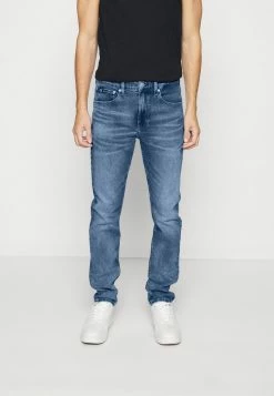 Calvin Klein Jeans SLIM TAPER - Jeans Fuselé - Denim Medium -Calvin Klein Elegant Magasin 817484a3f7fc4dfbaf556dcafbf54b34
