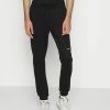 Calvin Klein Jeans MICRO BRANDING PANT - Pantalon De Survêtement - Black