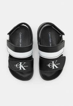 Calvin Klein Jeans UNISEX - Sandales - Black/white -Calvin Klein Elegant Magasin 874f29a1b03d48d7b3d8b0604487aa27