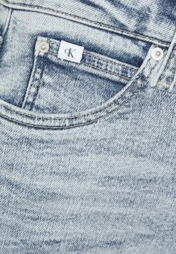 Calvin Klein Jeans HIGH RISE SUPER SKINNY ANKLE - Jeans Skinny - Denim Light -Calvin Klein Elegant Magasin 8a07947d1b374f4cbb30d19b3a4d66e7