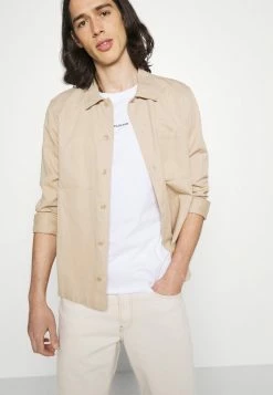 Calvin Klein Jeans MICRO BRANDING ESSENTIAL TEE - T-shirt Basique - White 9 Calvin Klein Jeans MICRO BRANDING ESSENTIAL TEE - T-shirt Basique - White -Calvin Klein Elegant Magasin 8b6461e3e5c447a182b120f8f5253e9e