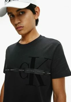 Calvin Klein Jeans T-shirt Imprimé - Ck Black -Calvin Klein Elegant Magasin 8c305517e88c42ec805cffbc854043c8
