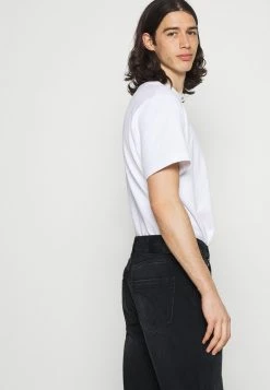 Calvin Klein Jeans DAD JEAN - Jean Boyfriend - Denim Black -Calvin Klein Elegant Magasin 8e0f73a92a1a4bcb80fa8ab4f940b643