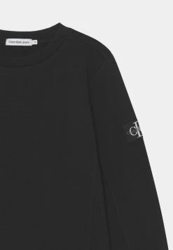 Calvin Klein Jeans BADGE - Sweatshirt - Black 5 Calvin Klein Jeans BADGE - Sweatshirt - Black -Calvin Klein Elegant Magasin 910d841fac42442986653154b05d6d4e