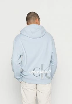 Calvin Klein Jeans CUT OFF TWO TONE MONOGRAM HOODIE UNISEX - Sweat à Capuche - Bayshore Blue -Calvin Klein Elegant Magasin 912bada47e6d49879c54348f276a4dad
