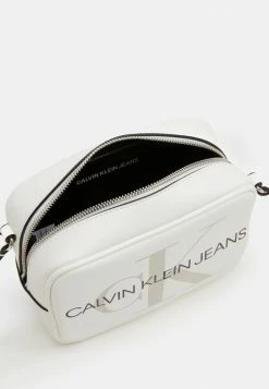 Calvin Klein Jeans CAMERA BAG - Sac Bandoulière - White -Calvin Klein Elegant Magasin 918d0ad2a6664398bb43db875a4b056a