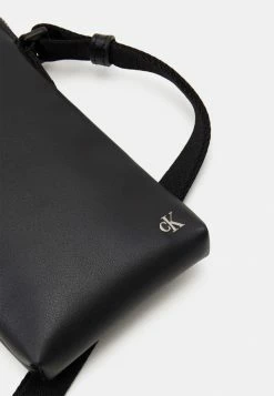 Calvin Klein Jeans MONO HARDWARE PHONE XBODY - Étui à Portable - Black -Calvin Klein Elegant Magasin 924637ee62d34c73bb3620fa7e430a32
