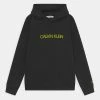 Calvin Klein Jeans INSTITUTIONAL LOGO - Sweat à Capuche - Black/acid
