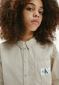 Calvin Klein Jeans RELAXED UTILITY - Chemisier - Tawny Sand 9 Calvin Klein Jeans RELAXED UTILITY - Chemisier - Tawny Sand -Calvin Klein Elegant Magasin 96d7fd6cc6b54745a8a25cb13711302e