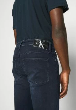 Calvin Klein Jeans SKINNY - Jean Slim - Denim Dark -Calvin Klein Elegant Magasin 978256d1c8654068a43067696126a939