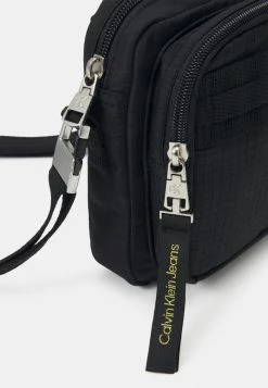 Calvin Klein Jeans SMALL XBODY UNISEX - Sac à Main - Black -Calvin Klein Elegant Magasin 9784d0f4b93f43a795ed47e92152f340