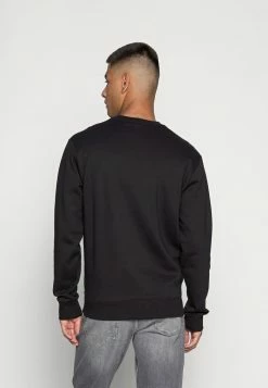 Calvin Klein Jeans MONOGRAM FLOCK TAPE CREW NECK - Sweatshirt - Black -Calvin Klein Elegant Magasin 979d2eb7503b473c97cf1464e3354ffe