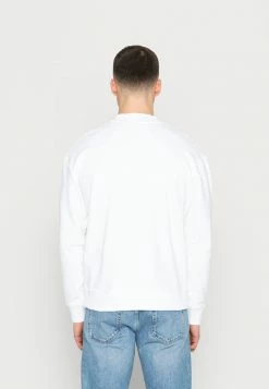 Calvin Klein Jeans DYNAMIC CREW NECK UNISEX - Sweatshirt - Bright White -Calvin Klein Elegant Magasin 97f59ef2a35549d0a7f763486130d5d3